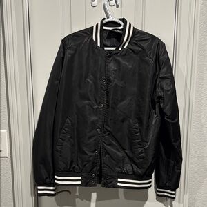 Sleek Black Varsity Jacket with Striped Details